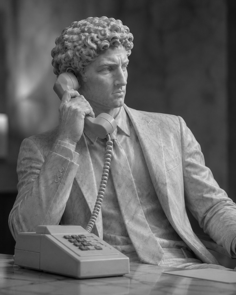 Harumesu, rendered as a marble statue at a desk